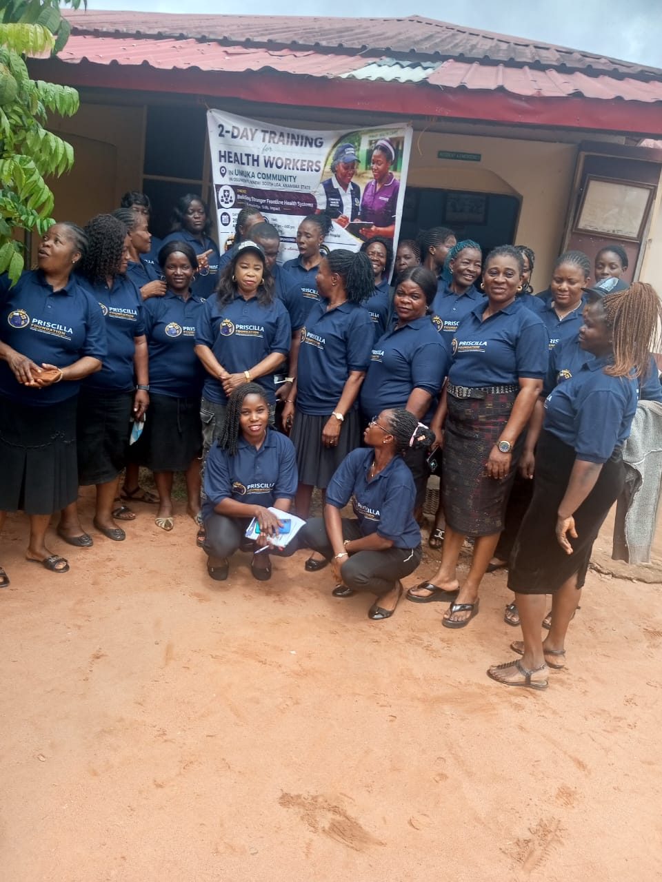 Participants assembled under the banner